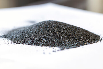 Close up view of the iron oxide for sand blasting or abrasive blasting. Iron oxides are chemical compounds composed of iron and oxygen. They are used as iron ores, pigments, catalysts.