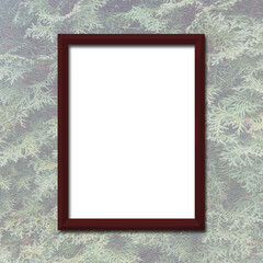Brown frame mockup on green wall. - 504627801