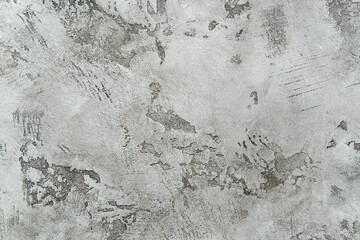 Textured grey putty. the background texture of Venetian plaster as a patterned wall.