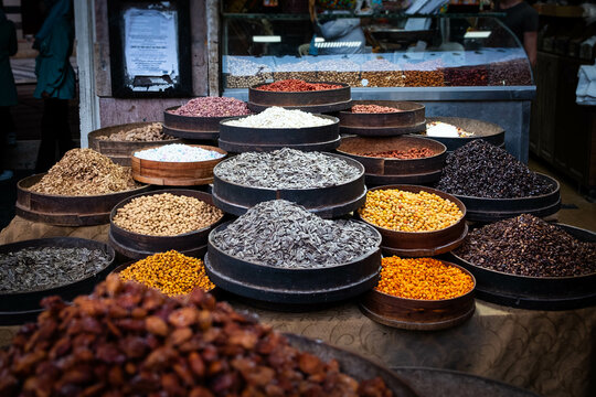 Piles of nuts, seeds, salty snacks and coffee beans at roastery, Damascus