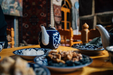 National islamic tea ceremony with desserts in Uzbekistan