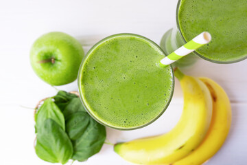 Banana mix spinach apple smoothie green juice beverage healthy the taste yummy in glass for on...