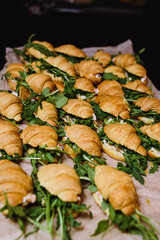 croissants with ham and salad leaves street food snack