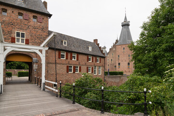 Naklejka premium Doorwerth Castle, a moated castle in the floodplains of the Rhine near the village of Doorwerth, in the Dutch province of Gelderland.