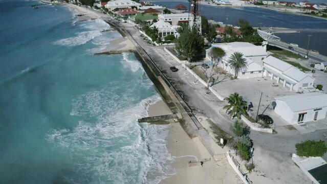 Aerial video of cutwater piers on Grand Turk, Turks and Caicos, drone footage of Cockburn Town coastline
