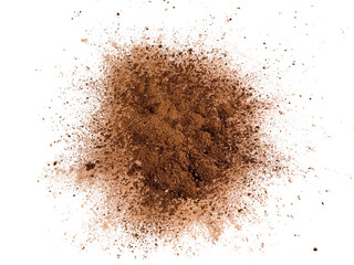 Dry cocoa powder explosion on white background - 504648663