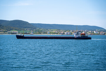 Large and Empty Cargo Ship at Sea