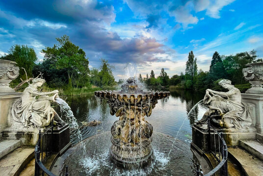 London, UK - May 14, 2022: The Italian Gardens and fountains in Kensington Gardens overlooking Serpentine lake. A gift from Prince Albert to Queen Victoria in 1860, they are peaceful tourist spot.