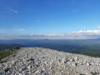Fototapeta na wymiar Landscape with rocks and blue sky, mountain Trebevic and Bjelasnica panorama, Bosnia and Herzegovina