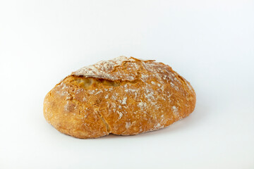 Freshly baked homemade bread on a white background. Cooking at home, top view