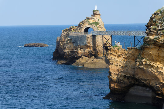 Biarritz, France, Rock of the Virgin -Rocher de la Vierge in French at sunny day over Atlantic ocean