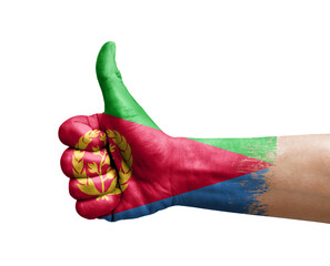 Hand making thumb up painted with flag of eritrea