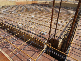 SELANGOR, MALAYSIA -MAY 3, 2022: Steel reinforcement bars for reinforced concrete construction have...