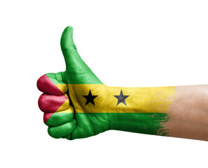 Hand making thumb up painted with flag of sao tome and principe