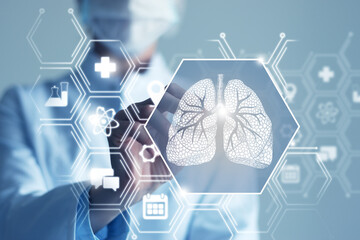 .Unrecognizable female doctor holding graphic virtual visualization model of Lungs organ in hands....