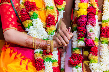 Indian Hindu married couple's holding hands close up