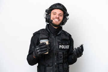 Brazilian soldier man isolated on white background holding coffee to take away and a mobile