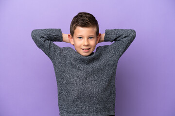 Little boy isolated on purple background laughing