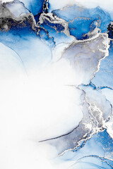 Blue silver abstract background of marble liquid ink art painting on paper . Image of original artwork watercolor alcohol ink paint on high quality paper texture .