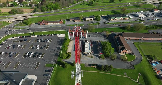 Technology And Communication Tower Theme. Aerial Review Of Rural Scene And Business Offices In USA.