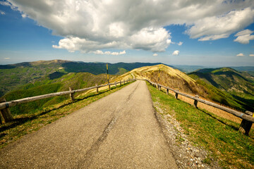 The street descending from the Lesima Peak (Lombardy, Northern Italy); is a small mountain near the borders between Piedmont, Lombardy and Emilia Regions, home of an aviation balloon-shaped radar.