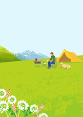 Young man and his dog enjoying camp in spring nature - Vertical