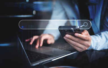 Data Search Technology Search Engine Optimization SEO concept. Business woman hand using laptop computer and mobile phone to search the information