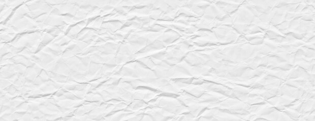 Crumpled paper texture background. White creased wrinkled paper sheet surface