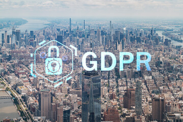 Aerial panoramic helicopter city view of Upper Manhattan, Midtown and Downtown, New York, USA. GDPR hologram, concept of data protection regulation and privacy for all individuals