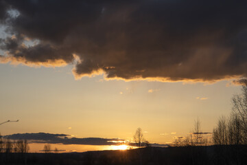 Fototapeta premium sunset over the clearing,clouds