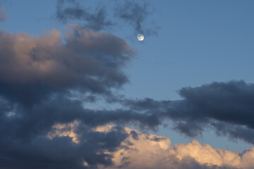 moon in the sky with clouds