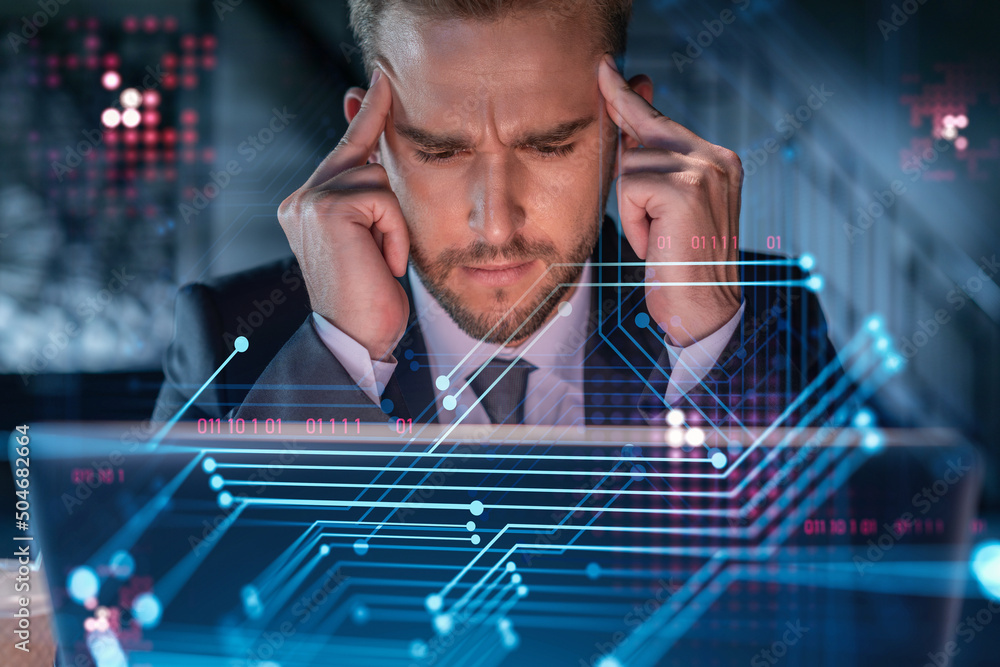 Poster handsome businessman in suit at workplace working with laptop to optimize development by implying ne