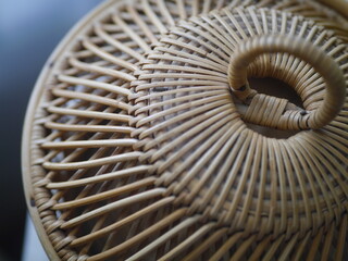 Close-up of an antique Asian-style woven basket.