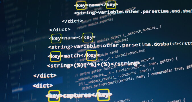 Website HTML Code on the Laptop Display Closeup Photo. Modern tech. Innovative startup project.