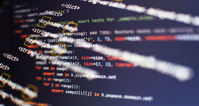 Website HTML Code on the Laptop Display Closeup Photo. Modern tech. Innovative startup project.