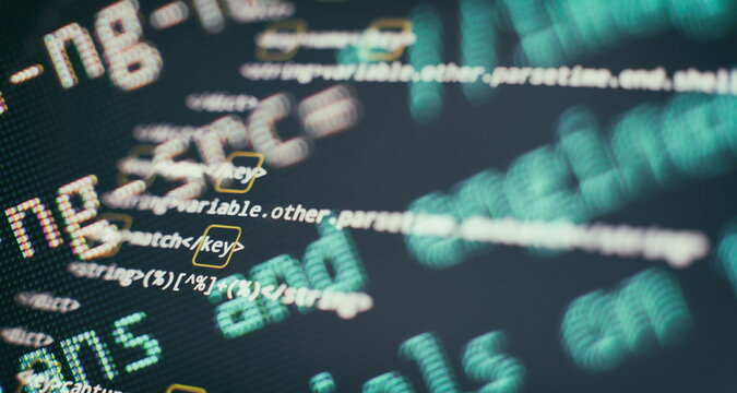 Website HTML Code on the Laptop Display Closeup Photo. Modern tech. Innovative startup project.