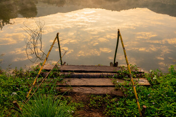Lake with fog on the water surface in the early morning