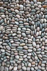 Fototapeta na wymiar pebbles background for home and home exterior wall and floor decoration . vertical shot
