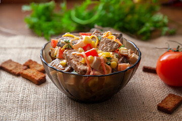 Fresh salad with tomato and cracker