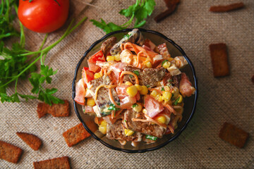 Fresh salad with tomato and cracker
