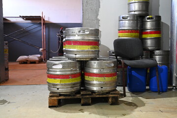 Photo of barrels with finished beer at the beer production