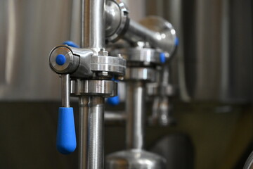 faucet on the background of beer production