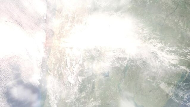 Earth zoom in from outer space to city. Zooming on Santiago del Estero, Argentina. The animation continues by zoom out through clouds and atmosphere into space. Images from NASA