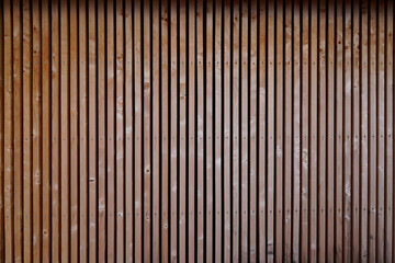 brown wooden background with old painted boards