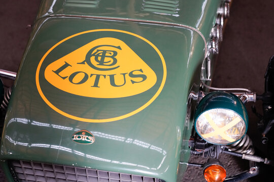 lotus logo brand and text sign on vintage race seven hood race car