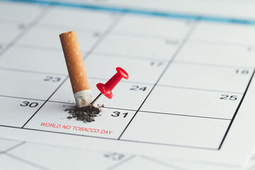 World No Tobacco Day. The cigarette broke on the May 31 calendar and had a red pin on it. the idea...
