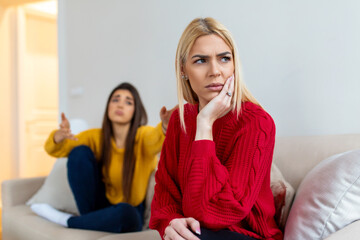 Woman apologizes to her friend after fight. Repentant woman hope for forgiveness from sad pensive...