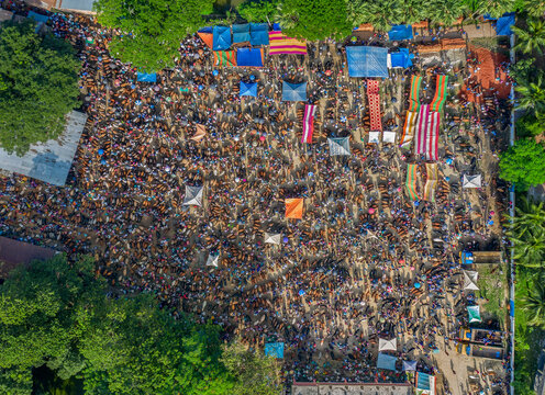 Thousands of cows are lined up to be sold at a bustling cattle market in Bangladesh. Over 50,000 of the animals are gathered together by farmers.