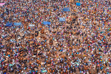Thousands of cows are lined up to be sold at a bustling cattle market in Bangladesh. Over 50,000 of the animals are gathered together by farmers.