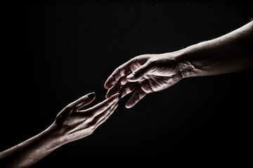Two hands. Helping hand to a friend. Rescue or helping gesture of hands. Concept of salvation....